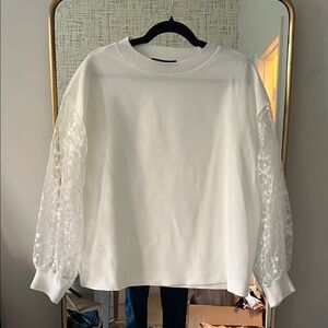 Elegant White Top with Sheer Sleeves